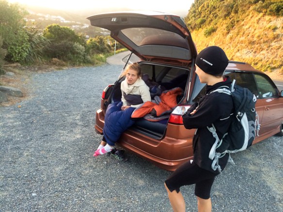 Ewa not enjoying the early morning shift being on support watch at top of Makara Hill - apparently sleeping in a car is not that fun whilst people are out running through the night